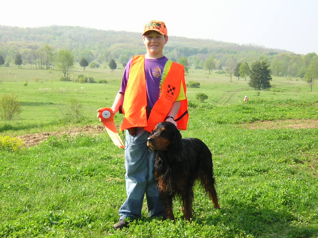 Boy and Gordon Setter with Ribbon